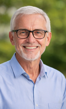 Professional portrait representing strategic business leadership